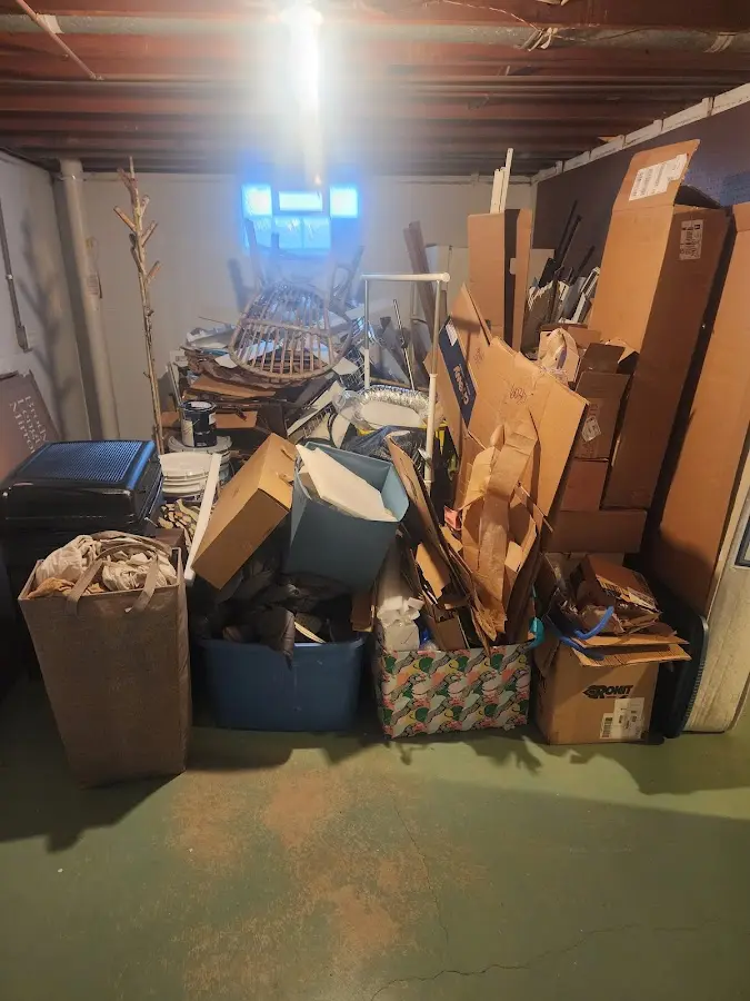 Roll-off dumpster container at job site for 20 Yard Dumpster Rental in Justice